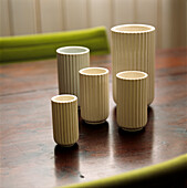 Ceramic vase display on wooden table