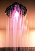 Pink light in showerhead with water