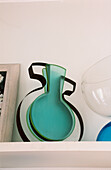 Open shelf with contemporary handmade vases