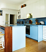 Open plan kitchen in blue with kitchen island