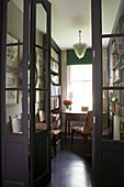 Landing library painted in grey with built in shelving