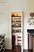 Kitchen pantry with storage shelves