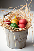 Bucket with Coloured eggs