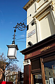 Old fashioned street lantern on corner of London street, England, UK