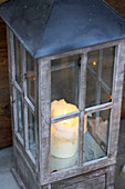 Lit candle in metal lantern, Zermatt, Valais, Switzerland