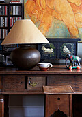 Elephant ornament and lamp on wooden console in Evershot home, Dorset, Kent, UK