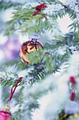 Close-up of bauble on Christmas tree