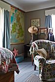 Crochet blanket on armchair in bedroom of Rye family home, East Sussex, England, UK