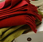 Red and green folded blankets