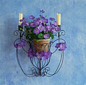 Metalwork candle holder and wall mounted flower pot