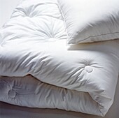 Folded bedding close up with Duvet and Pillow