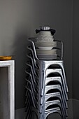 Stacked plates and jelly mould on silver chairs