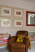 Vintage leather armchair and botanical artwork in Lewes home,  East Sussex,  England,  UK