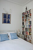 Bookcase in bedroom of Bordeaux apartment building,  Aquitaine,  France