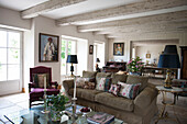Open plan beamed living room in Dordogne  country residence  Perigueux  France