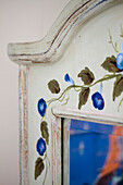 Hand-painted mirror frame in Amberley farmhouse, West Sussex, England, UK