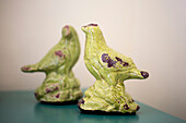 Two lime green bird ornaments in Petworth farmhouse West Sussex Kent