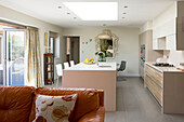 Open plan kitchen with skylight in renovated coastal beach house West Sussex UK