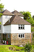Detached weatherboard and stone house  United Kingdom
