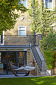 Hammock on terrace in garden of London family townhouse  England  UK