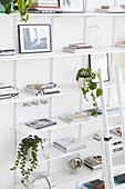 Double height open shelving in London home  UK