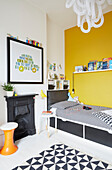 Grey  yellow and white boys room in modernised Preston home  Lancashire  England  UK