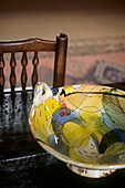 Still life of kitchen chair and ceramic bowl