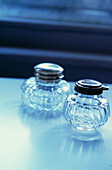 Two cut glass scent bottles 