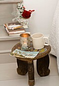 Mug and tealight on small oriental stool