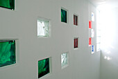 White wall with color glass bricks