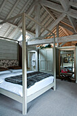 Wood framed bed in Wiltshire home
