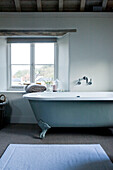 Freestanding bath at window of Wiltshire home
