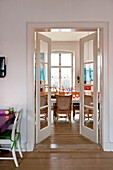 View through double doors to dining room in Odense