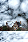 Country house set in winter landscape Odense Denmark