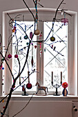 Christmas decorations at window of modern Odense family home Denmark