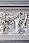 Cornucopia and female lion carved into marble fireplace in historic Yeovil Somerset, England, UK