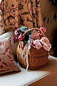 Assorted ribbons in a basket in Walberton home, West Sussex, England, UK