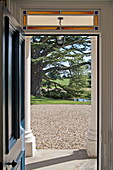 View through doorway of contemporary Suffolk country house, England, UK