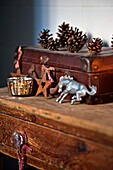 Christmas decorations on wooden side table in Tregaron home Wales UK