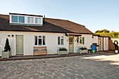 Single storey holiday home with paved driveway, Cornwall, UK