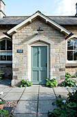 Porch entrance to old stone church conversion in Stamford Lincolnshire England UK