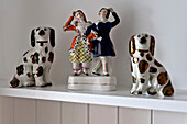 Figurine ornaments on shelf in beach house Cornwall England UK