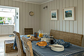 Breakfast table with croissants and jam in Penzance farmhouse Cornwall England UK
