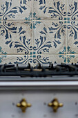 Fired Earth tiles above oven in grade II-listed Victorian kitchen Godalming Surrey UK