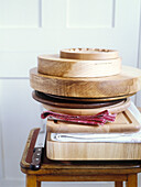 Stacked chopping boards and kitchen knife