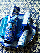 Wrapping paper tied with blue ribbon