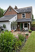 Garden exterior of Tenterden family home, Kent, England, UK