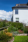 Flowerbeds in garden of Dartmouth home Devon UK