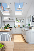 Pale grey kitchen diner with skylights in Oxfordshire UK