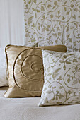 Gold and leaf patterned cushions in Cambridgeshire home UK
